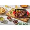 imageLe Creuset Enamaled Cast Iron Square Grill 95quot Caribbean