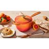imageLe Creuset Enameled Cast Iron Signature Oval Dutch Oven 675 qt Flamme Doree with Crucible Knob23 Quarts