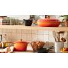 imageLe Creuset Enameled Cast Iron Signature Oval Dutch Oven 675 qt Flamme Doree with Crucible Knob23 Quarts