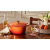 imageLe Creuset Enameled Cast Iron Signature Oval Dutch Oven 675 qt Flamme Doree with Crucible Knob45 Quarts